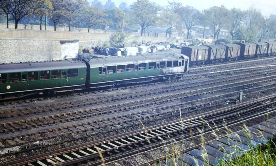 Following the 22nd September 1965 fatal collision at Roundstone Level crossing, fire damaged 2 BIL unit no.2105 awaits its fate in Brightons North Sidings during November 1965. The body of the Driving Trailer Composite was scrapped at Brighton with the Motorcoach overhauled at Eastleigh, thence into 4 LAV unit no.2943.
 (Late) David Cole
