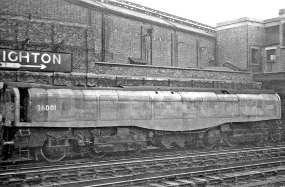 Brighton Locomotive Depot
Bulleid's first 'Leader' at Brighton on 18th December 1949 no. 36001 was the prototype of Bulleid's revolutionary design of steam engine, nominally an 0-6-6-0T, and the only example that was actually completed (in June 1949). It ran a number of trials on the Southern Region for some months, but never worked a service train before the project was cancelled in 1951 owing to its various serious drawbacks.
 Seen from a train just outside Brighton Station, this rather poor snap was nevertheless an unusual 'cop' .
  Ben Brooksbank (CC-by-SA/2.0)