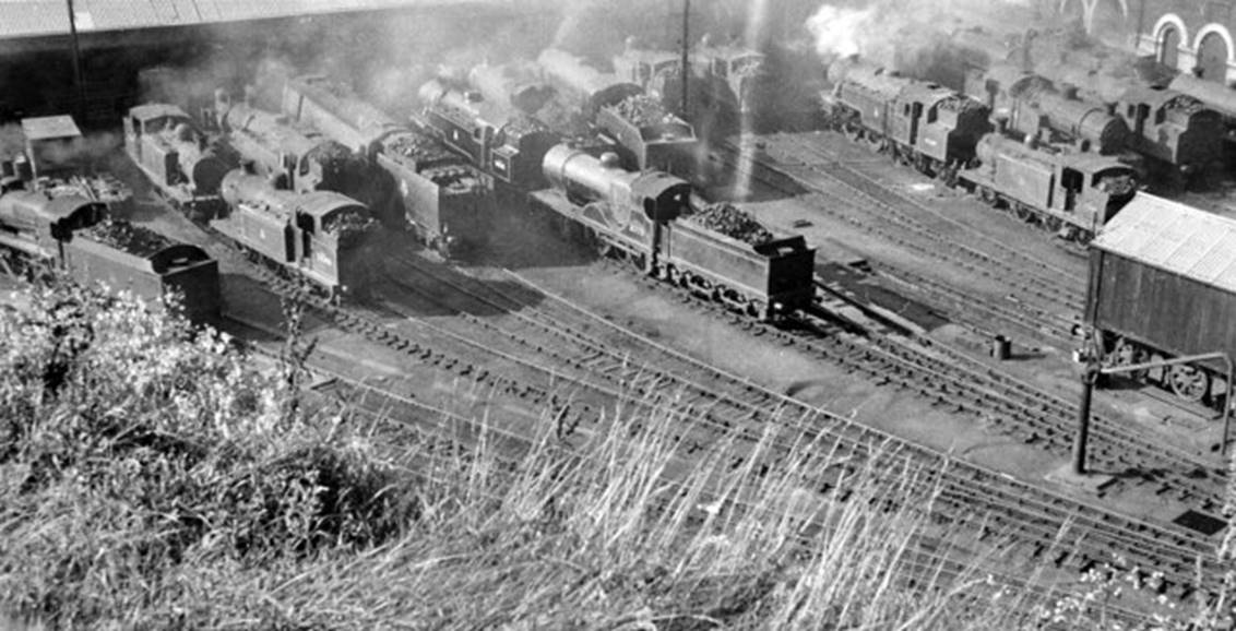 Brighton Locomotive Depot
From the platform 1 A1x ‘Terrier’ no.32636 (of Newhaven Depot) had worked the RCTS Sussex Rail Tour to Seaford and back on 7th October 1962 (with no.32418). 
Behind on the left is the slope-sided tender of ‘Schools’ no.30923 ‘Bradfield’, on the right is rebuilt Bulleid Light Pacific no.34012 ‘Launceston’.
© Ben Brooksbank (CC-by-SA/2.0)
