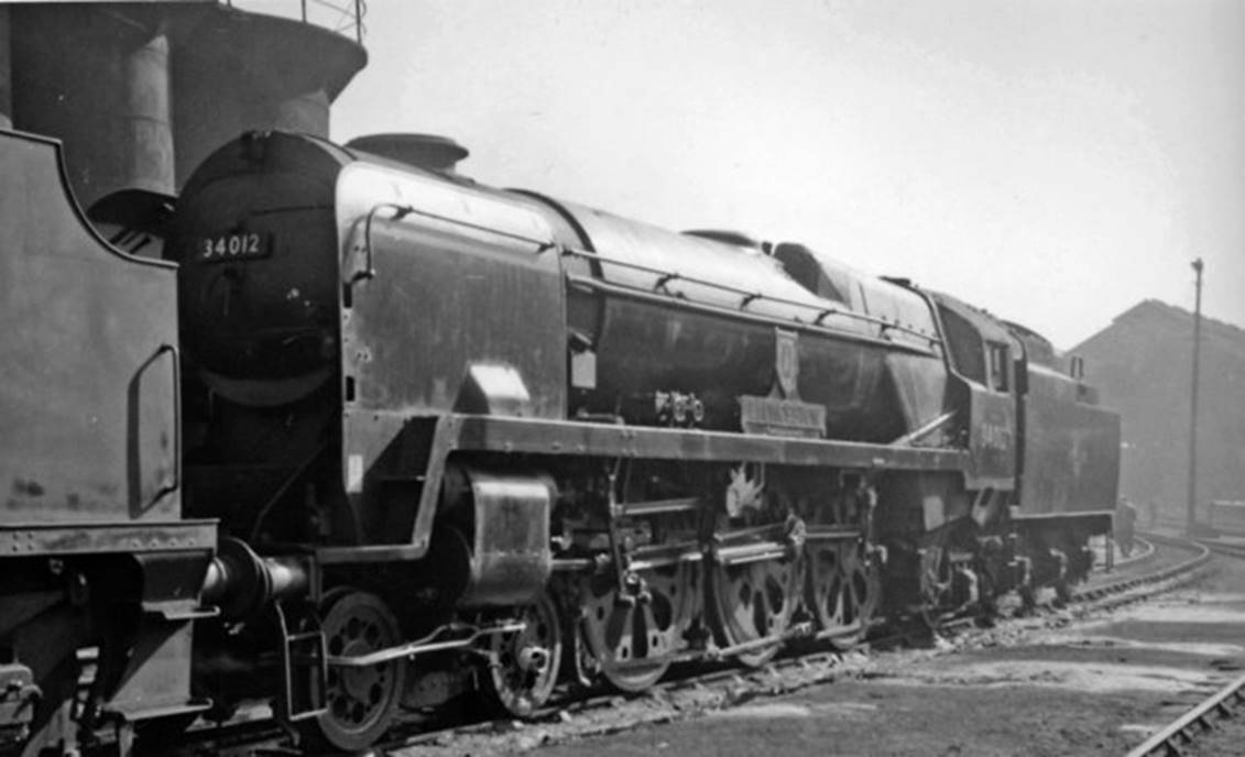 Brighton Locomotive Depot
BR Standard 4MT no. 80153 (built February 1957 - the penultimate, withdrawn March 1965) is seen with two standard Diesel 0-6-0 shunters. [7th October 1962].
© Ben Brooksbank (CC-by-SA/2.0)
