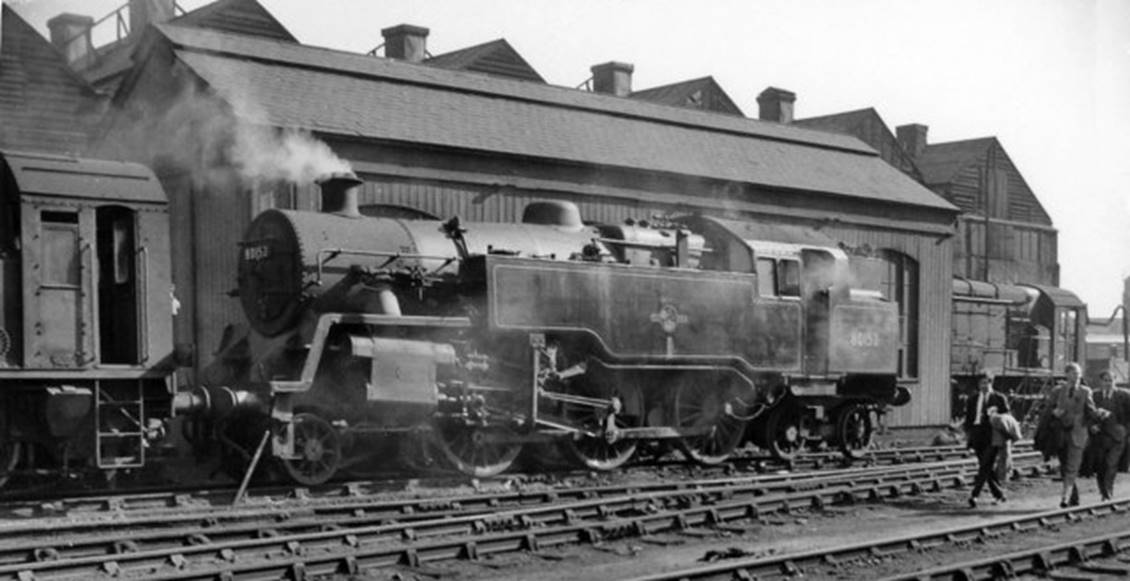 Brighton Locomotive Depot
BR Standard 4MT no. 80153 (built February 1957 - the penultimate, withdrawn March 1965) is seen with two standard Diesel 0-6-0 shunters. [7th October 1962].
 Ben Brooksbank (CC-by-SA/2.0)
