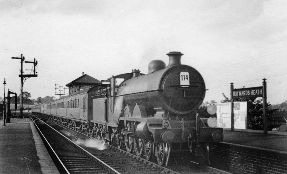 Set 469 with Pullman cars heading south through Haywards Heath behind Brighton Atlantic no.B421 South Foreland on Saturday 19th July 1930.
 HC Casserley
