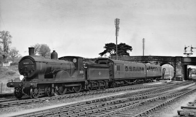 ‘P’ set 179 (coaches 6673 & 3732) hauled by T9 locomotive 30313 leaves Yeoford with the 3.48pm Exeter Central to Okehampton service on Saturday 7th May 1960.
© S.C. Nash (Mike King Collection)
