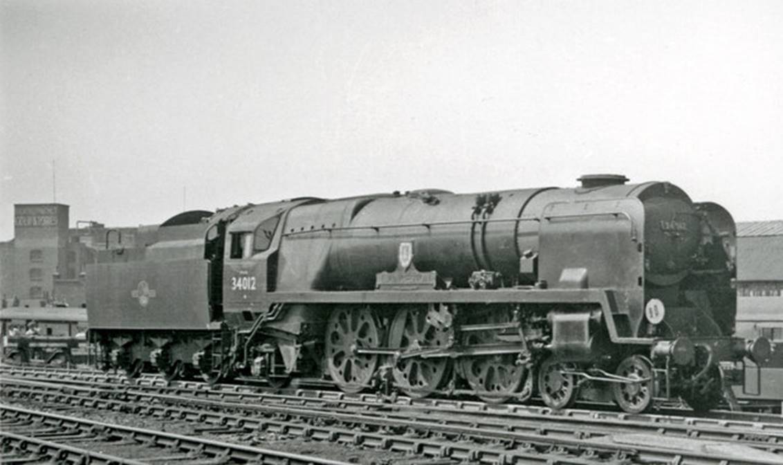 View northward near North Kent West Junction and Rotherhithe Road Carriage Sidings on 9th July 1958. No.34012 'Launceston' was built October 1945 as no. 21C112, rebuilt January 1958 & withdrawn December 1966.
 Ben Brooksbank (Geograph/CC-by-SA)
