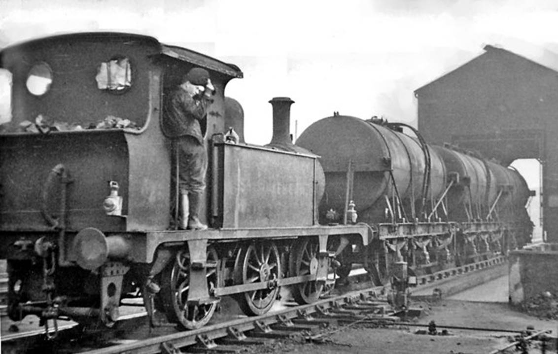 Ex-SECR P-class on the milk shunt at Stewarts Lane Depot 7th April 1951. No.31558 was built June 1910, withdrawn February 1960. There hardly seems room for two men in the cab - one of whom is waving to me.
 Ben Brooksbank (Geograph/CC-by-SA)
