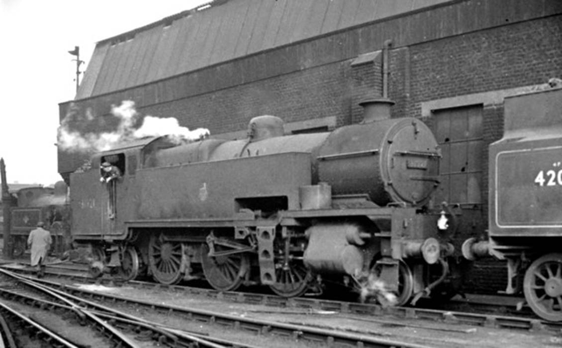 15th February 1958 and Maunsell W-class 2-6-4T no. 31921 (built October 1935, withdrawn June 1963) was one of a class of fifteen used almost exclusively on freight workings between London Yards.
 Ben Brooksbank (Geograph/CC-by-SA)
