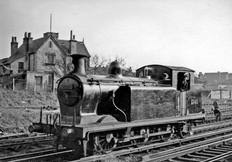 With the branch from Crystal Palace (Low Level) just visible behind the locomotive, on 2nd April 1958 no. 32413 (R. Billinton E6 class, built July 1905 as 'Fenchurch') looks in good condition even though it was withdrawn in November 1958.
© Ben Brooksbank (CC-by-SA/2.0)
