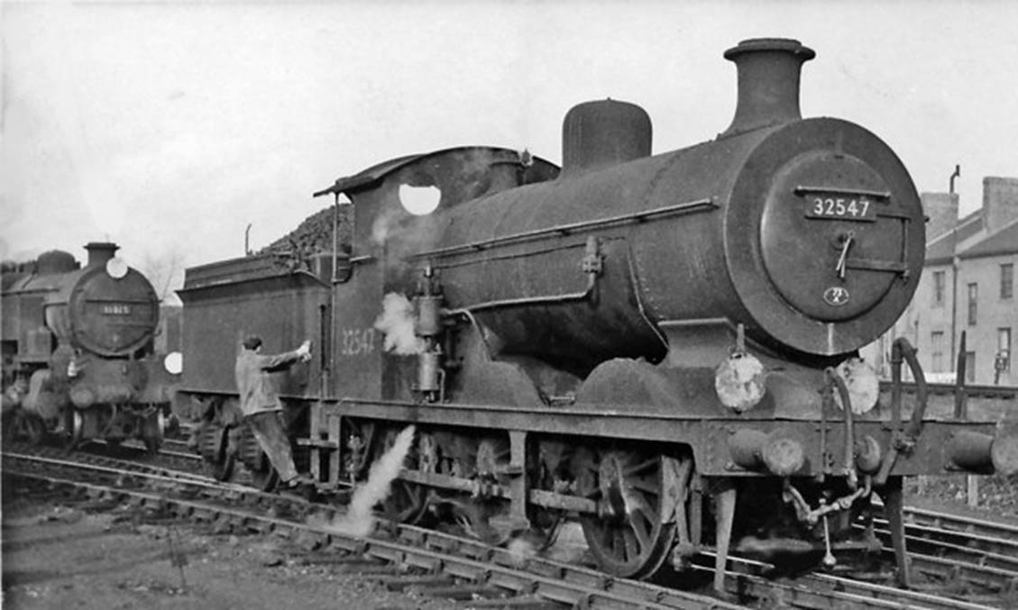 On 12th March 1960 cautiously moves northwards towards W-class no.31918. R. Billintons no.32547 was one of the few C2X-class that did not have a double-dome boiler. Built as C2 No. 547 in January 1902, rebuilt October 1908, it survived until November 1961.
 Ben Brooksbank (Geograph/CC-by-SA)
