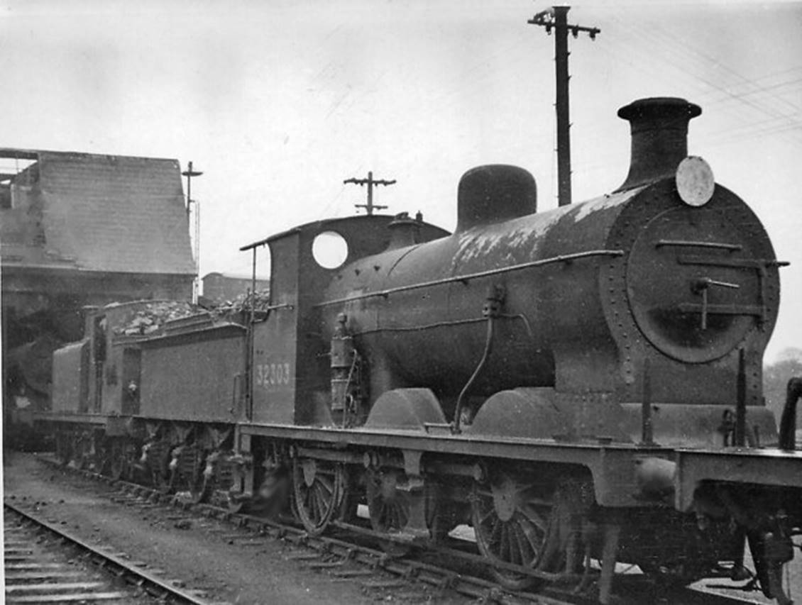 Three Bridges Locomotive Depot on a wintry Saturday, 11th December 1948   afternoon with ex-LBSCR Marsh C3-class no.32303 (built June 1906, withdrawn September 1951).
 Ben Brooksbank (Geograph/CC-by-SA)
