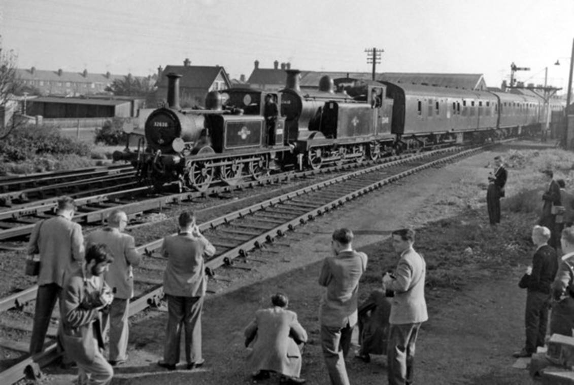 Sunday, 7th October 1962 and The Railway Correspondence & Travel Society 'Sussex Rail Tour' train, with its A1X no. 32636 & E6 no.32418 hauling ex-Man of Kent Mk1 set 279, is pulling into Newhaven Town station to pick up the tour passengers after they had visited the Shed.
 Ben Brooksbank (Geograph/CC-by-SA)
