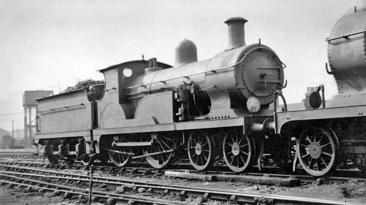 Ex-SE&CR class B1 no1021 was a Wainwright rebuild (April 1913) of a Stirling Class B (built October 1898). In its younger days dashing down to Dover on Continental Boat Expresses. However, on 19th May 1946 was now near its demise (in December 1947). 
Tonbridge was an important junction with extensive freight yards and the Depot had an allocation in 1947 of 64 locomotives comprising: 13 off 4-4-0, 3 off 2-6-0, 22 off 0-6-0, 3 off 0-6-2T, 4 off 0-6-0T and 18 off 0-4-4T.
 Ben Brooksbank (CC-by-SA/2.0)
