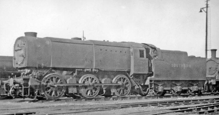 www.BloodandCustard.com
In the Locomotive Yard at Feltham, one of the variety of locomotives was a modern (wartime) example of Bulleid's SR Q1 no.C37, built December 1942 and photographed on 27th September 1947. After nationalization it became the more conventionally (BR) numbered no.30037 and survived until October 1963.
© Ben Brooksbank (CC-by-SA/2.0)
