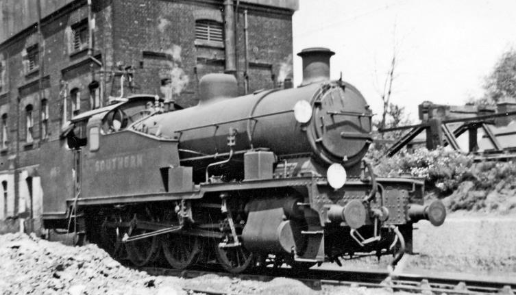 One of the only eight SR Maunsell Z class 0-8-0Ts, no.952 (built May 1929, withdrawn November 1962) stands on the preparation roads at Eastleigh Depot in 1946 - pre-Nationalisation. Normally, the Z class were employed in major SR marshalling yards, but during World War Two three (not no.952) worked at Faslane Military Port near Stranraer. 
Displaced by Diesel shunters in the 1950s, they were found work at various other places, notably at Exeter where they were ideal for banking trains up from St Davids to Central.
© Ben Brooksbank (CC-by-SA/2.0)
