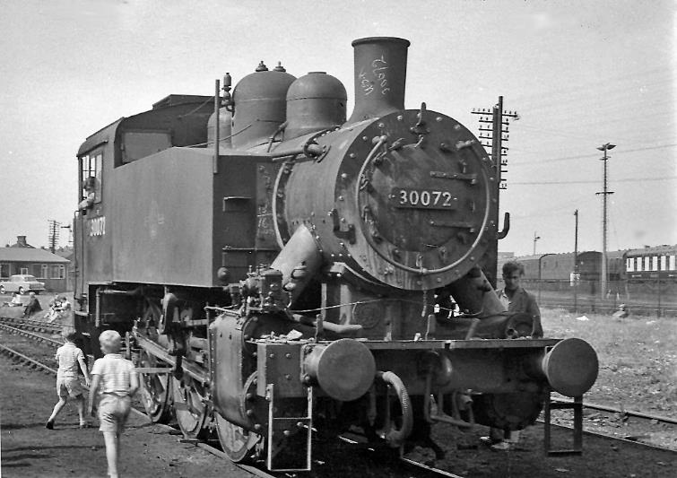 No.30072 is a late survivor of the hundred or so American wartime 'switchers' brought over by the US Army in 1942-43 for subsequent use on the Continent after the Liberation, but before D-Day were employed at Depots or stored in Britain. #
After the War, in 1946 fouteenwere purchased by the SR for use at Southampton Docks, numbered 61-74 (BR 30061-74); no.30072 had been USA Transportation Corps No. 1973, built by Vulcan in 1943: it survived on BR until July 1967 and was the last one. It is now preserved on the Keighley & Worth Valley Railway.
 Ben Brooksbank (CC-by-SA/2.0)
