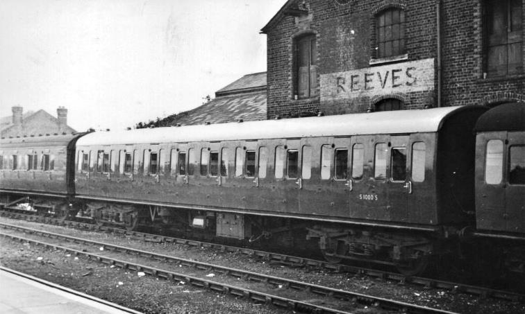 November 1963
Allocated Loose to Hayling Island services, Green-livered GRP-bodied S1000S awaits its next turn of duty in the sidings at Havant station during November 1963.
 P.H.Swift (Mike King collection)

