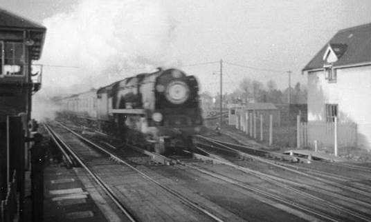 April 1961
Diverted Ocean Liner Express at Havant hauled by rebuilt West Country no. 34045 ‘Ottery St Mary’
© John Firth (CC-by-SA/2.0)
