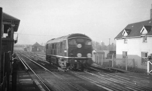 1961
Running light engine, BR(S)-allocated D5001 is about to cross Havants New Lane level crossing.
 John Firth (CC-by-SA/2.0)
