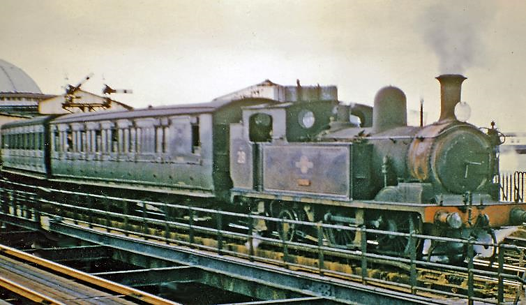 28th August 1965
In the penultimate summer of steam services on the Isle of Wight, W28 leaves Ryde Pier Head with the 14.20 to Shanklin. Adams O2 no. W28 'Ashey' was built July 1890 as no. 186, shipped to the island in March 1926 and withdrawn December 1966.
 Ben Brooksbank (CC-by-SA/2.0)
