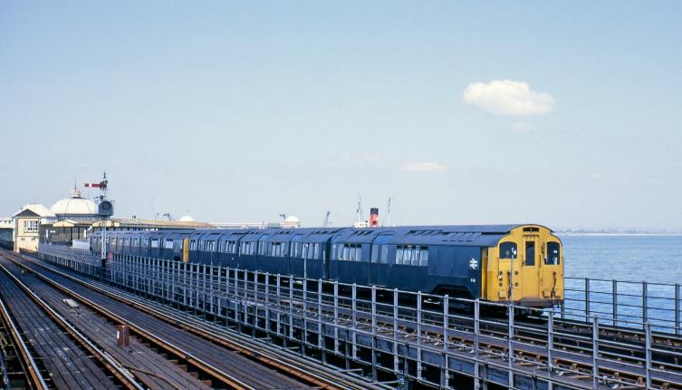A train on the railway tracks

Description automatically generated with medium confidence