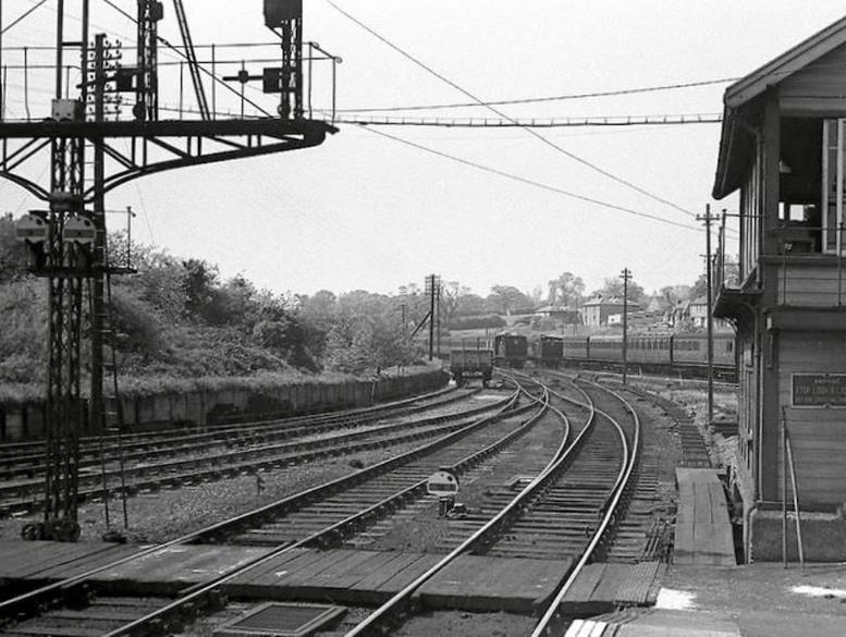 Train tracks next to a building

Description automatically generated with medium confidence