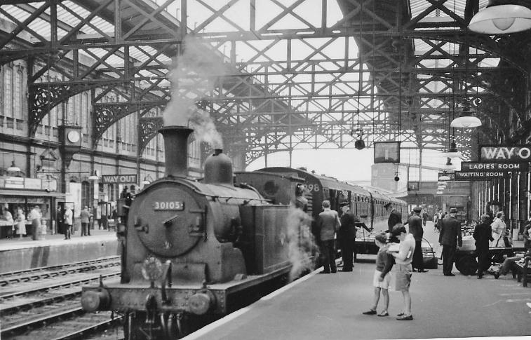 Bournemouth Central Station, with an 0-4-4T about to leave for Bournemouth West with rear portion of an express from Waterloo on  6th June 1960; the main portion of the 10.30am from Waterloo has already left for Weymouth. This locomotive is ex-LSWR Drummond M7 class no.30105 (built March 1905, withdrawn May 1963). 
“Some 'human interest' here”.
© Ben Brooksbank (CC-by-SA/2.0)

