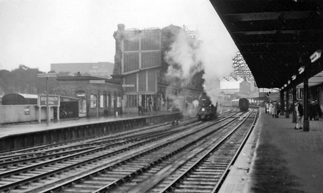 With an unidentified BR 4MT 2-6-0 on the Down centre road, view west at Bournemouth Central Station on 20th April 1963 towards Poole & Weymouth - also Bournemouth West until 4th October 1965.
 Photograph in the pouring rain 
  Ben Brooksbank (CC-by-SA/2.0)
